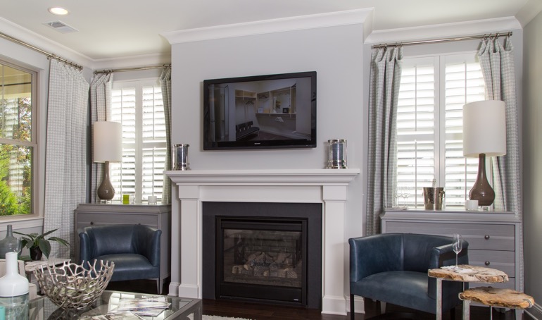 Honolulu fireplace with white shutters.